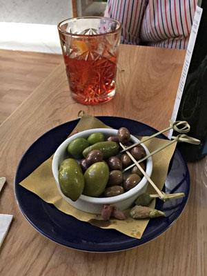 Picture of the chocolate negronis we eventally got and some not great olives.
