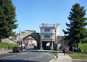 Picture of the later wooden dwelling at the back of Walgate Bar.